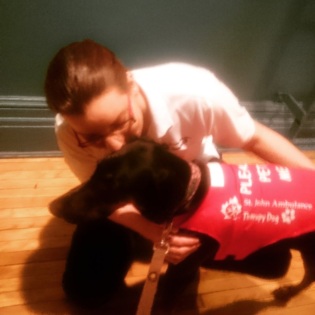 Mary Anne Mampe fitting Athena's "Please Pet Me" vest